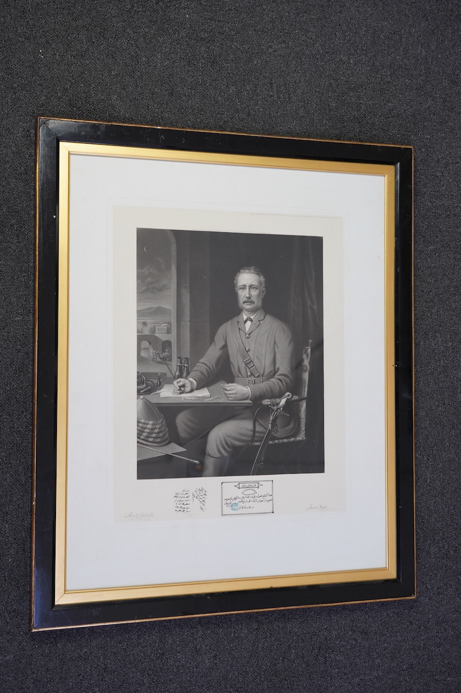 James Faed after Alexander Melville, Portrait of General Gordon seated in uniform with remarqué sketches of a dispatch in Arabic and facsimile paper money used at Khartoum, mezzotint, 54 x 42.5cm